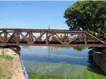 Wisconsin Central Railroad spur to Expera. Railroad bridge crossing the Fox River lock & canal